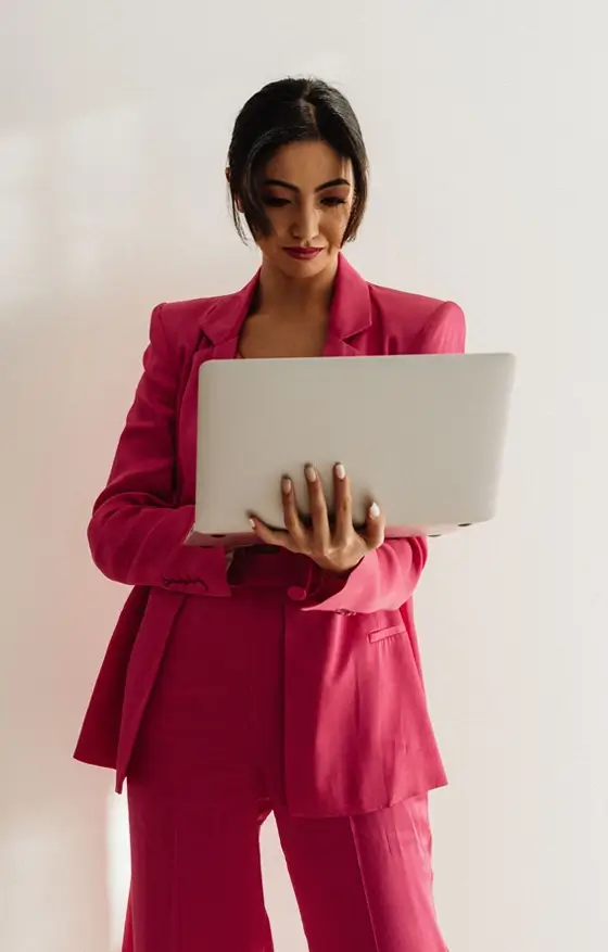 woman in pink business suit